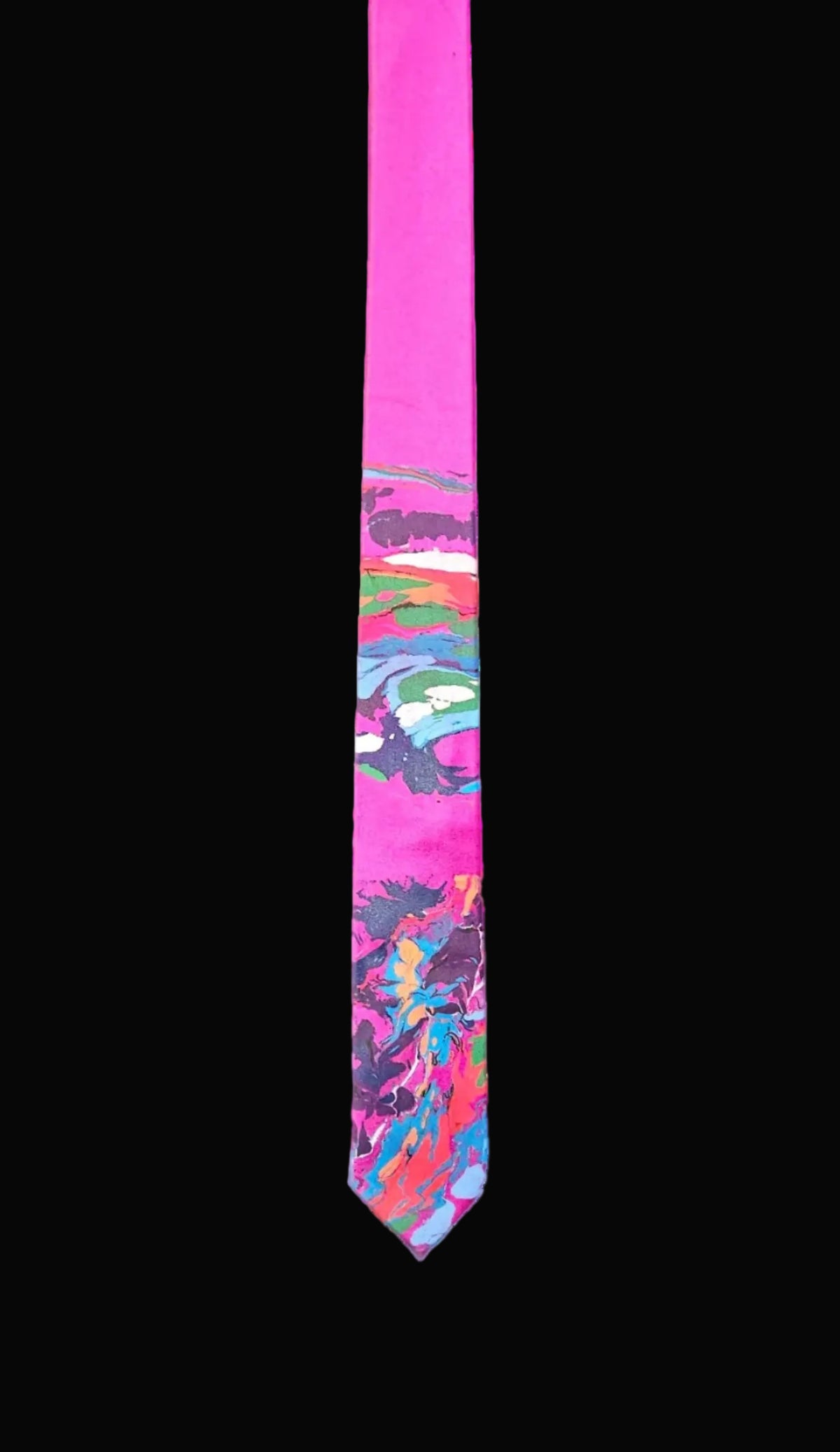Colorful tie with a pattern on a pink background